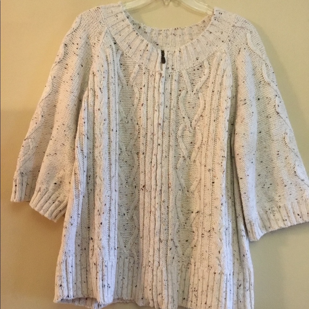 Zip up cardigan sweater.